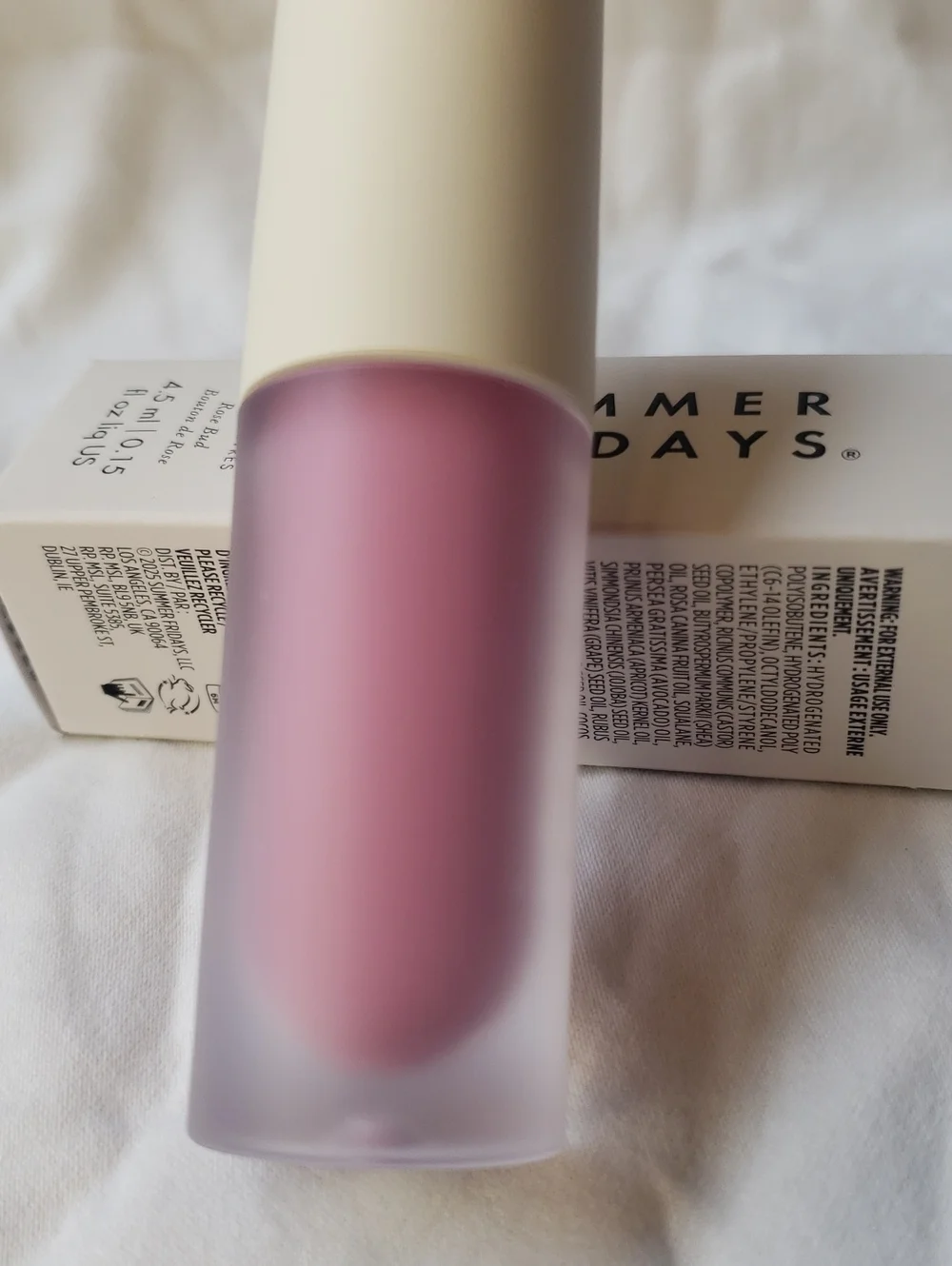 Summer Fridays Dream Lip Oil in Rose Bud sheer cool pink